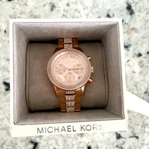 Michael Kors rose gold watch with pave diamonds
